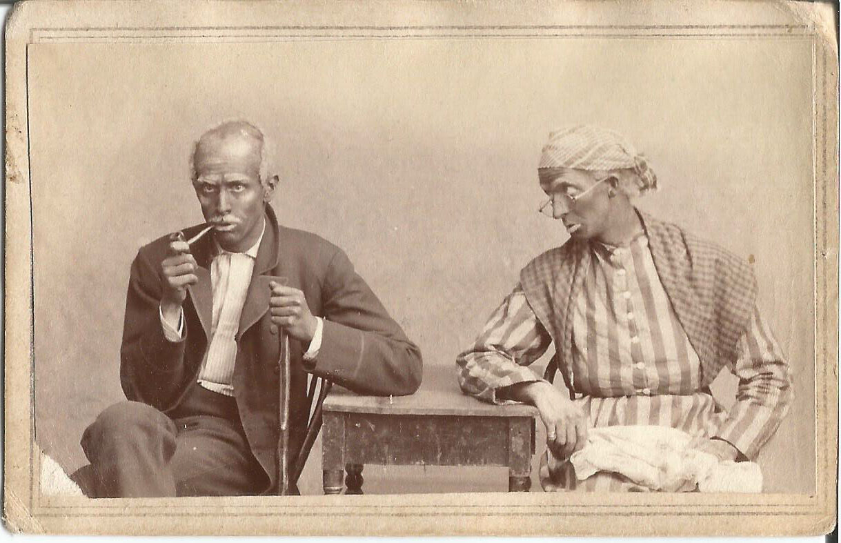 Two Seated at Table in Blackface