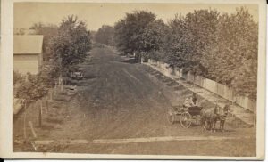 Long Dirt Road with Wagon