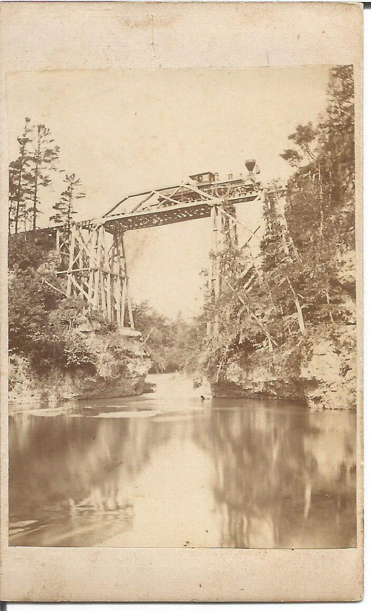 Train on Bridge Over River