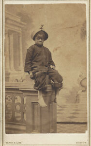 Young Boy with Pot on Head