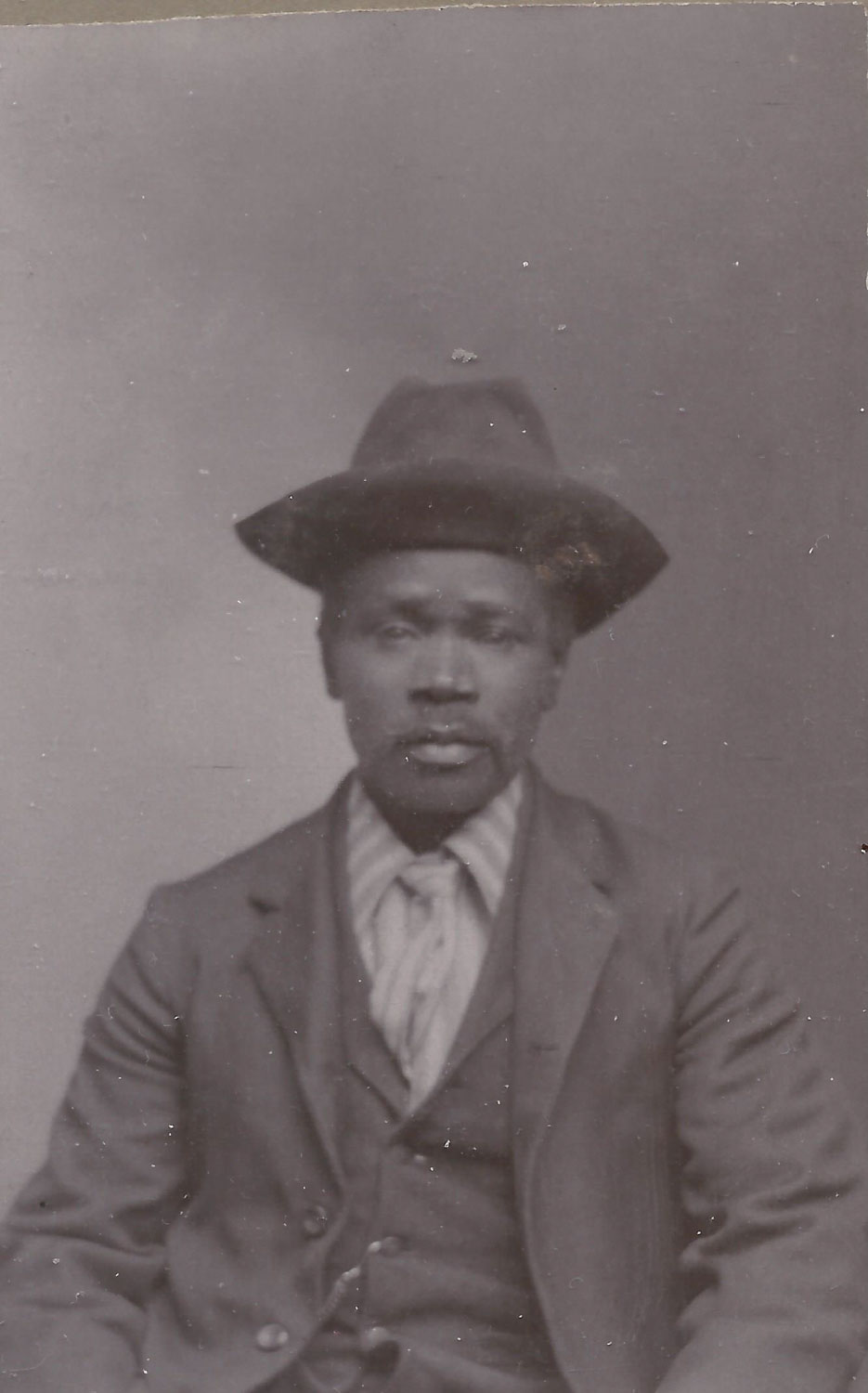 Free Black Man with Hat and Vest